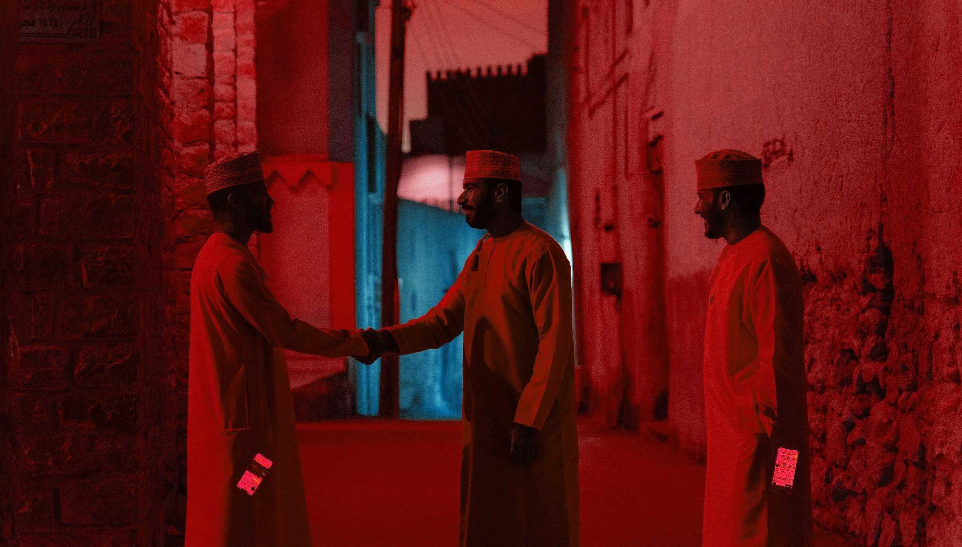 Omanis Shaking Hand